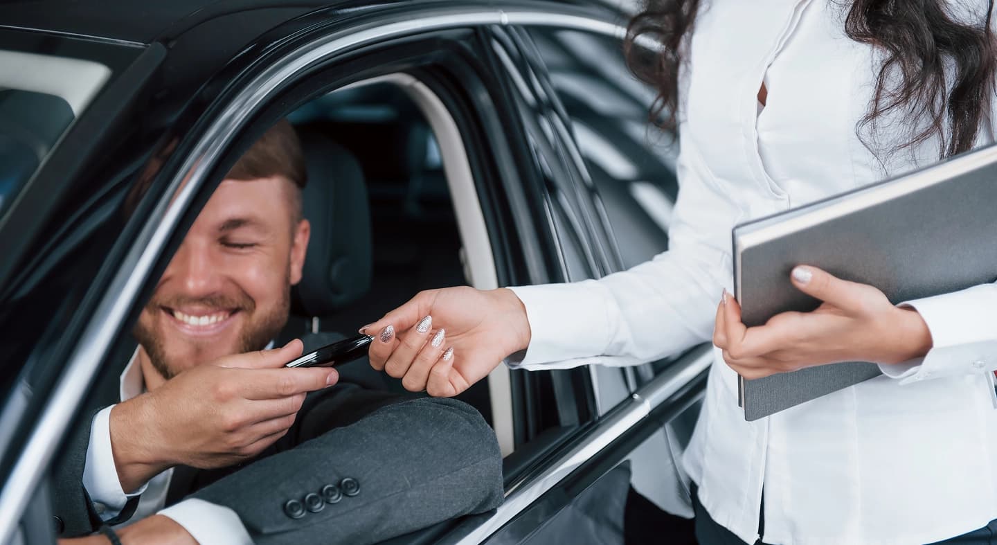 men in car company image